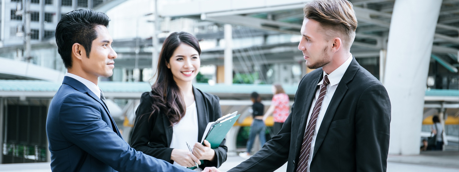 Business leaders shaking hands, cementing a successful outsourcing partnership for key business process functions