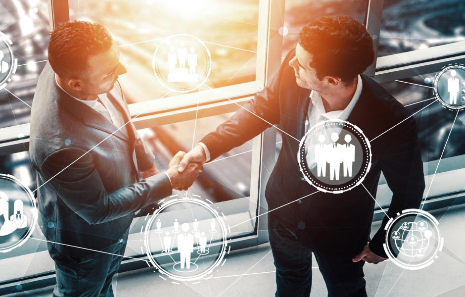 Handshake between business partners symbolizing effective vendor selection during an outsourcing decision