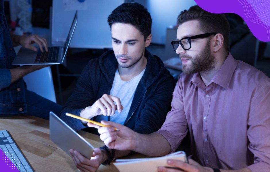 An access programmer and a client discuss the designed customized access database solution with strategic goals in mind.