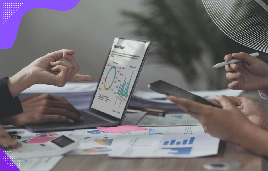 A software developer showing a client examples of strategic mobile consulting results like increased efficiency and revenue.