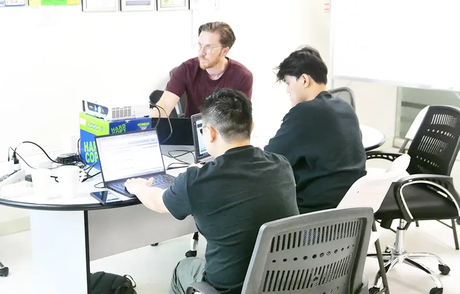 An access database programmer trains other employees on updates for a client's to accommodate their future growth plans.