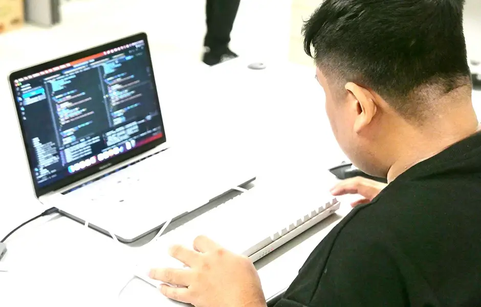 Metrics and results on a monitor showcasing improvements in data accuracy realized after implementing database solutions.